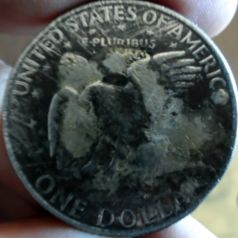 What-Happened-To-This-Ike-Dollar-?-Can-Anybody-Tell-Me?